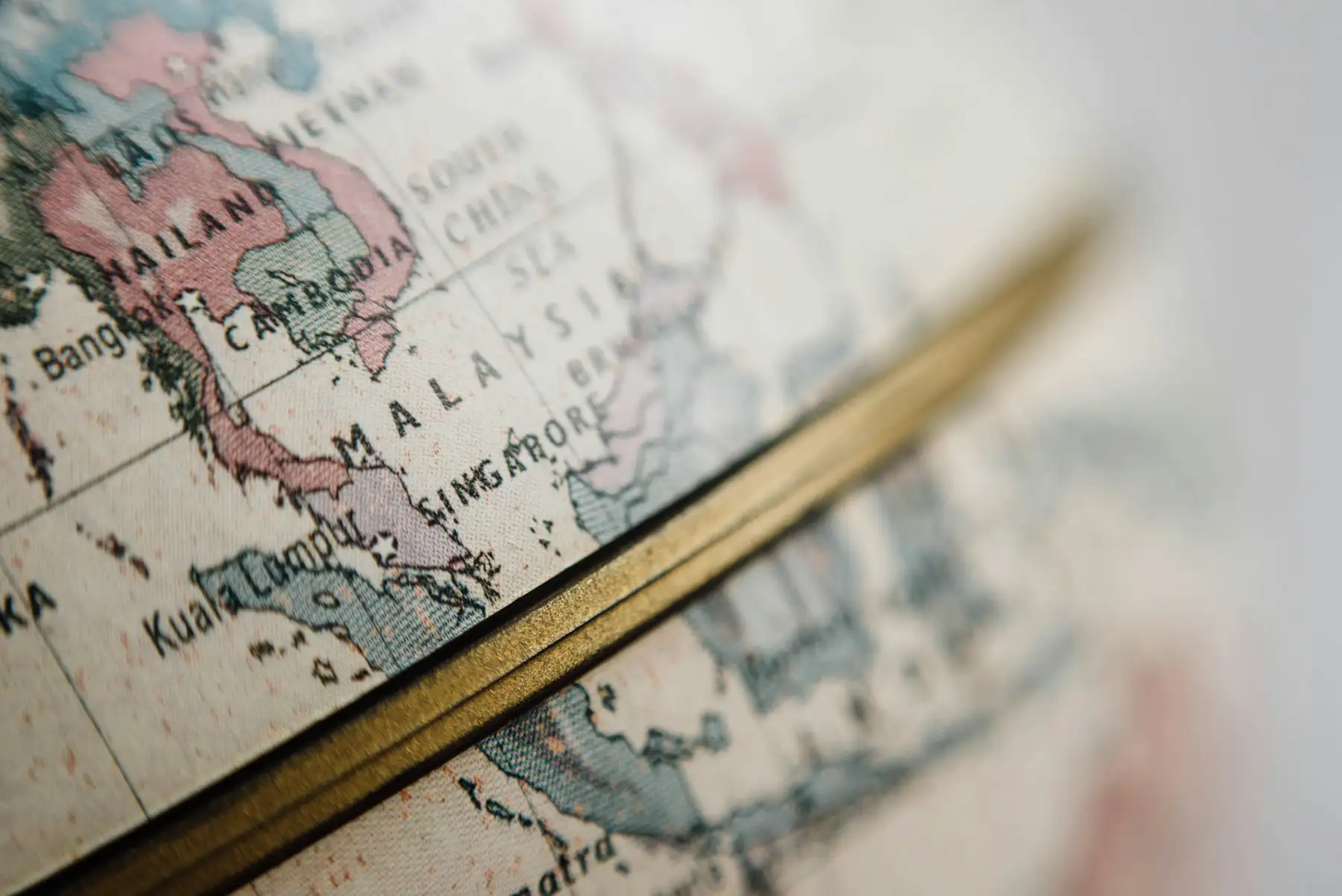 Close-up of a globe showing South-East Asia